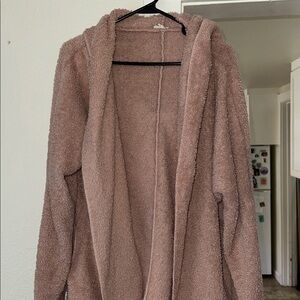 Blush pink soft hooded sweater. Has pockets. One size